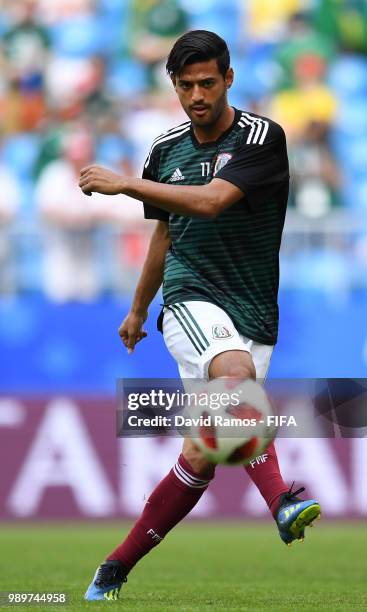 Carlos Vela of Mexico passes the ball during the warm up prior to the 2018 FIFA World Cup Russia Round of 16 match between Brazil and Mexico at...