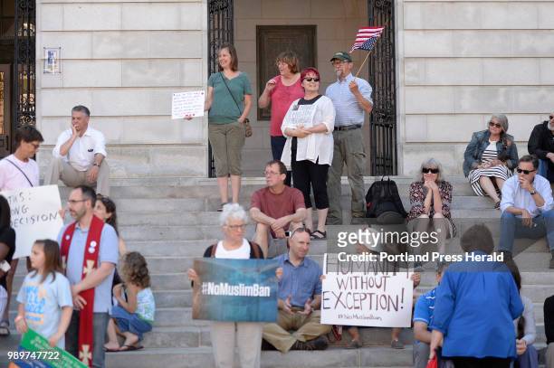 Crowd gathers for the Stand with Muslims rally at City Hall in re-action to the Supreme Court upholding Trump's travel ban. Monday June 25, 2018.