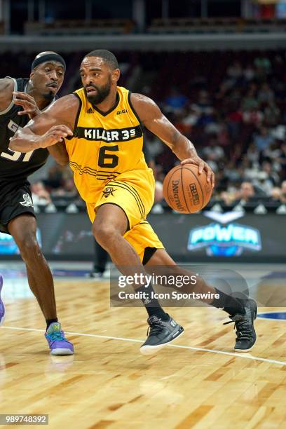 Alan Anderson of the Killer 3s battles with Ricky Davis of Ghost Ballers during a game in week two of the BIG3 three on three basketball league on...