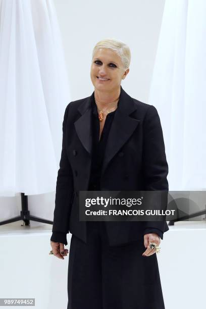 Italian fashion designer Maria Grazia Chiuri for Christian Dior acknowledges the audience at the end of the 2018-2019 Fall/Winter Haute Couture...