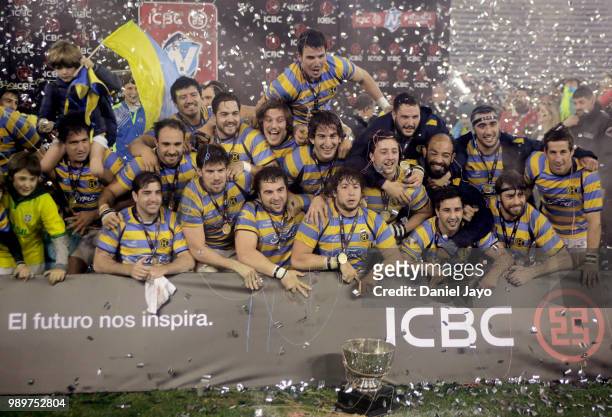 Players of Hindu celebrate with the trophy at the end of the final match between Hindu and Newman as part of Argentina National Rugby Championship...