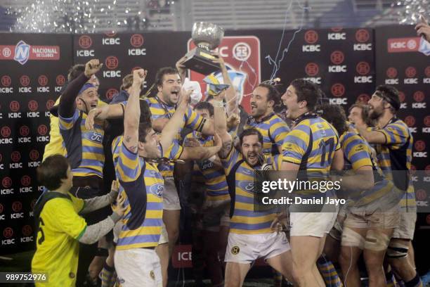 Players of Hindu celebrate with the trophy at the end of the final match between Hindu and Newman as part of Argentina National Rugby Championship...