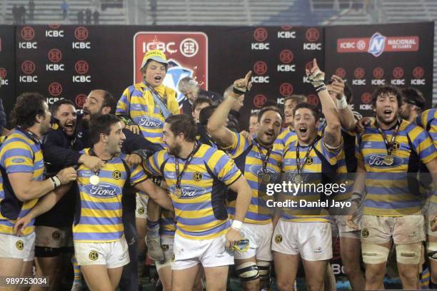 Players of Hindu celebrate with the trophy at the end of the final match between Hindu and Newman as part of Argentina National Rugby Championship...