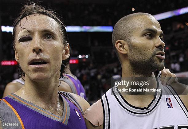 Guard Steve Nash of the Phoenix Suns talks with Tony Parker of the San Antonio Spurs in Game Four of the Western Conference Semifinals during the...