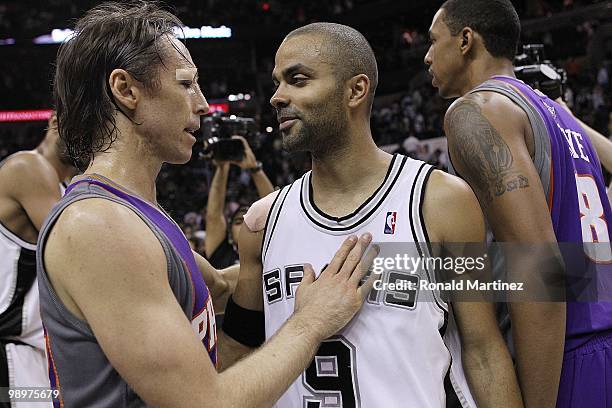 Guard Steve Nash of the Phoenix Suns talks with Tony Parker of the San Antonio Spurs in Game Four of the Western Conference Semifinals during the...