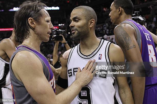 Guard Steve Nash of the Phoenix Suns talks with Tony Parker of the San Antonio Spurs in Game Four of the Western Conference Semifinals during the...