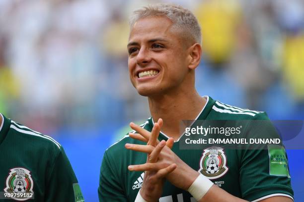 Mexico's forward Javier Hernandez reacts prior to the start of the Russia 2018 World Cup round of 16 football match between Brazil and Mexico at the...
