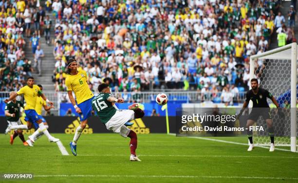 Hector Herrera of Mexico attempts a shot on target during the 2018 FIFA World Cup Russia Round of 16 match between Brazil and Mexico at Samara Arena...