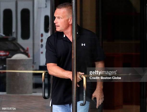 Retired State Police trooper Paul E. Cesan 50, of Southwick leaves the John Joseph Moakley United States Courthouse in Boston on June 27, 2018. The...
