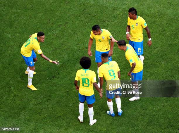 Neymar Jr of Brazil celebrates with teammates after scoring his team's first goal during the 2018 FIFA World Cup Russia Round of 16 match between...