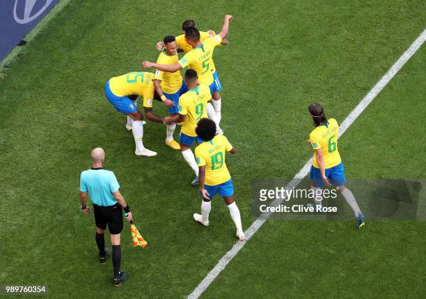 Neymar Jr of Brazil celebrates with teammates after scoring his team's first goal during the 2018 FIFA World Cup Russia Round of 16 match between...