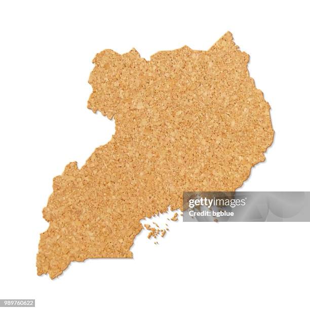 uganda map in cork board texture on white background - uganda pattern stock illustrations