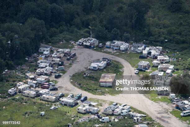 This aerial view taken on June 15 shows a travellers camp near Pierrelaye, North of Paris.