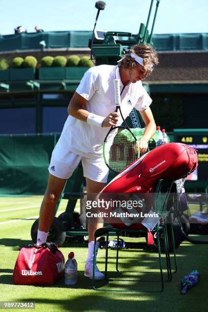 Stefanos Tsitsipas prepares for his Men's Singles first round match against Gregoire Barrere of France on day one of the Wimbledon Lawn Tennis...
