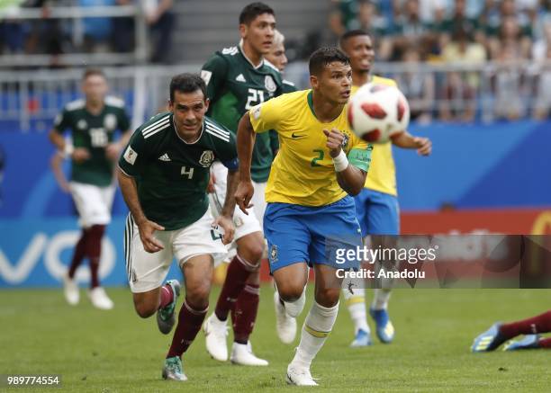 Thiago Silva of Brazil in action against Rafael Marquez of Mexico during the 2018 FIFA World Cup Russia Round of 16 match between Brazil and Mexico...