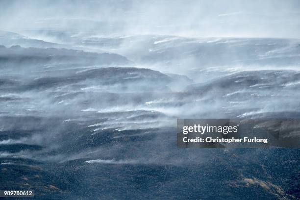 Distant view of Winter Hill near Bolton, shows the massive task firefighters are facing to control hundreds of smouldering embers on July 2, 2018 in...