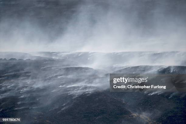 Distant view of Winter Hill near Bolton, shows the massive task firefighters are facing to control hundreds of smouldering embers on July 2, 2018 in...