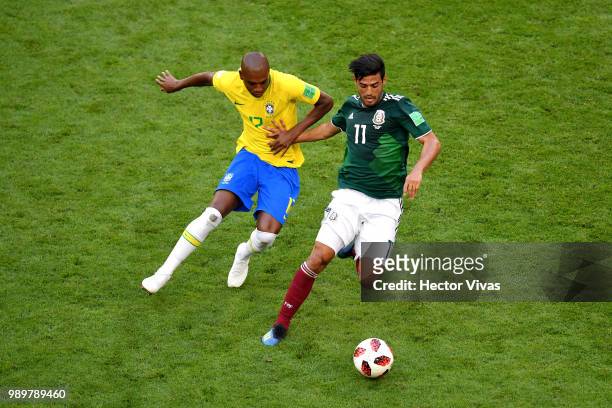 Carlos Vela of Mexico is challenged by Miranda of Brazil during the 2018 FIFA World Cup Russia Round of 16 match between Brazil and Mexico at Samara...