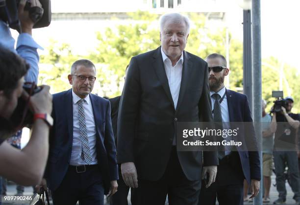Horst Seehofer, German Interior Minister and leader of the Bavarian Social Union , arrives to meet with German Chancellor and leader of the German...