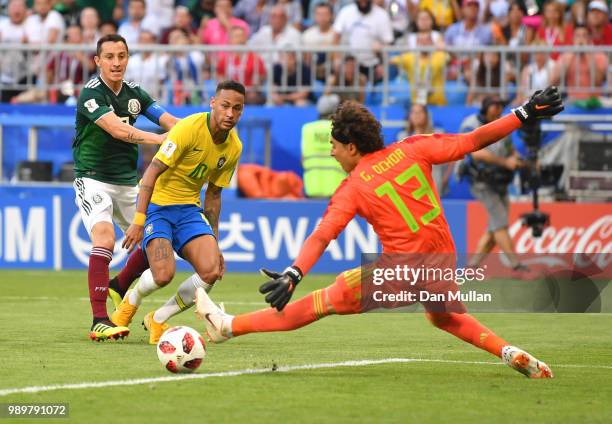 Neymar Jr of Brazil passes the ball to Roberto Firmino of Brazil for Brazil's second goal during the 2018 FIFA World Cup Russia Round of 16 match...