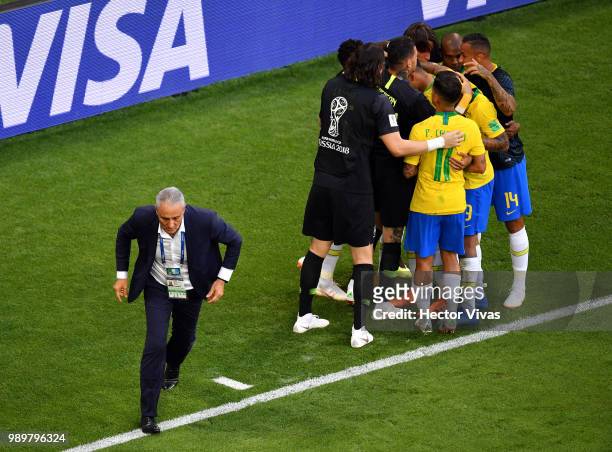 Roberto Firmino of Brazil celebrates with teammates after scoring his team's second goal during the 2018 FIFA World Cup Russia Round of 16 match...