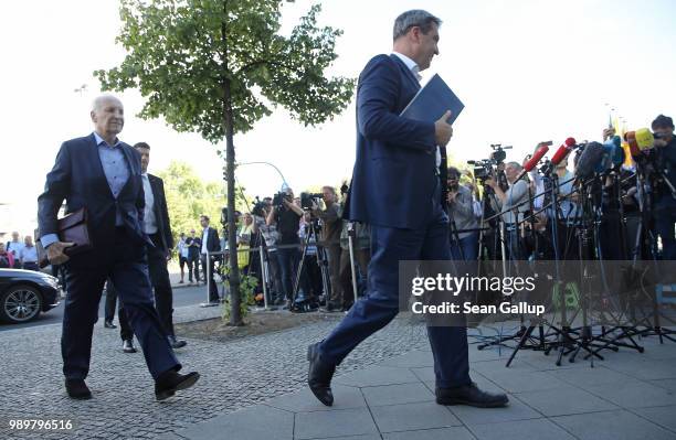 Markus Soeder , Governor of Bavaria and a leading member of the Bavarian Social Union , and Edmund Stoiber, former CSU leader, arrive shortly before...