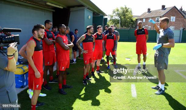 Andrew Robertson, Daniel Sturridge, Joel Matip, Danny Ward, Adam Lallana, Naby Keita and Fabinho of Liverpool during their first day back for...