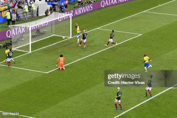 Roberto Firmino of Brazil scores his team's second goal during the 2018 FIFA World Cup Russia Round of 16 match between Brazil and Mexico at Samara...