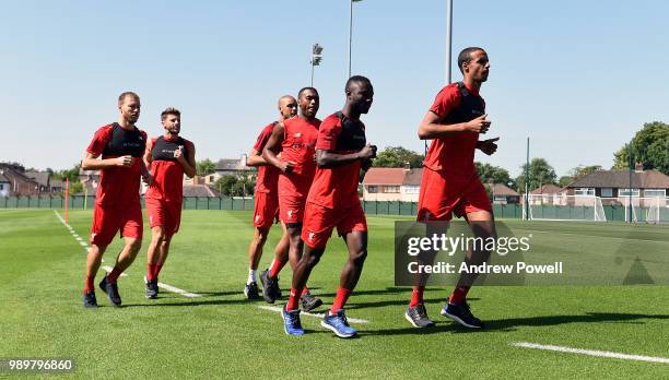 Ragnar Klavan, Daniel Sturridge, Joel Matip, Adam Lallana, Naby Keita and Fabinho of Liverpool during their first day back for pre-season training at...