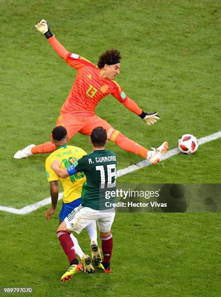 Neymar Jr of Brazil passes the ball to Roberto Firmino of Brazil for Brazil's second goal during the 2018 FIFA World Cup Russia Round of 16 match...