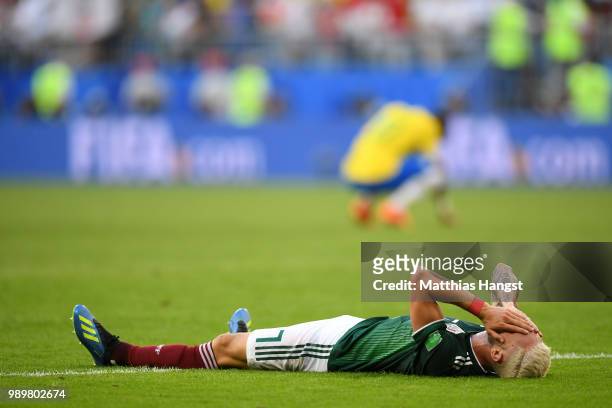 Miguel Layun of Mexico looks dejected following his sides defeat in the 2018 FIFA World Cup Russia Round of 16 match between Brazil and Mexico at...