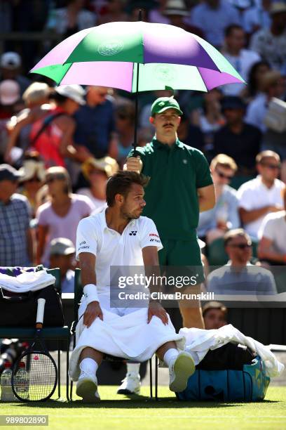 Stanislas Wawrinka of Switzerland reacts during his break in his Men's Singles first round match against Grigor Dimitrov of Bulgaria on day one of...