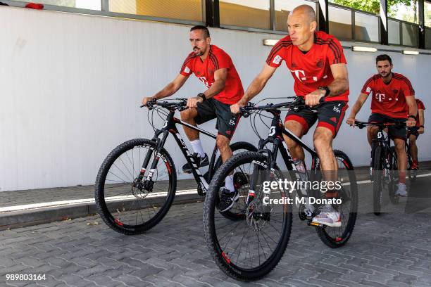 Franck Ribery, Arjen Robben and Sven Ulreich of FC Bayern Muenchen are seen on a bike ride on July 2, 2018 in Munich, Germany.