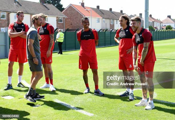Allan Rodrigues de Souza, Danny Ward, Loris Kaius Alberto Moreno and Lazar Markovic of Liverpool during their first day back for pre-season training...