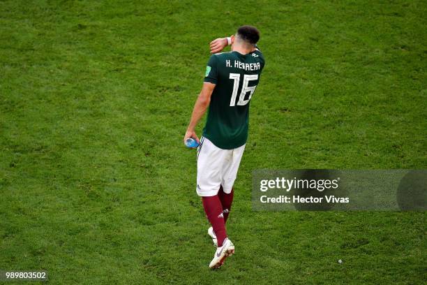 Hector Herrera of Mexico looks dejected following his sides defeat in the 2018 FIFA World Cup Russia Round of 16 match between Brazil and Mexico at...