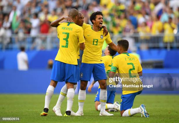 Fernandinho, Miranda, Marquinhos and Thiago Silva of Brazil celebrate victory following the 2018 FIFA World Cup Russia Round of 16 match between...