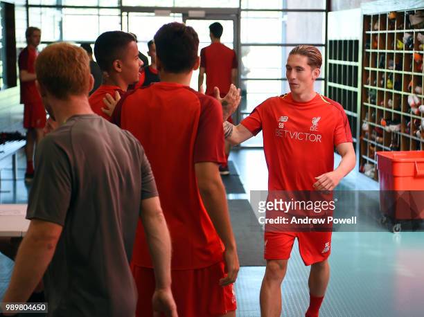 Harry Wilson, Allan Rodrigues de Souza and Pedro-Chirivella of Liverpool during their first day back for pre-season training at Melwood Training...