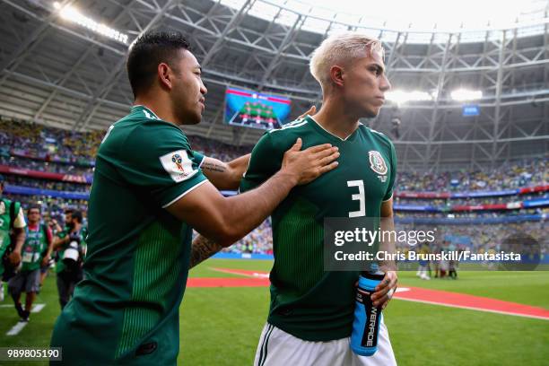 Carlos Salcedo of Mexico shakes hands with teammate Marco Fabian before the 2018 FIFA World Cup Russia Round of 16 match between Brazil and Mexico at...