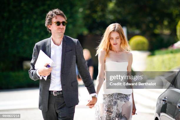 Antoine Arnault and Natalia Vodianova, outside the Dior show, during Paris Fashion Week Haute Couture Fall Winter 2018/2019, on July 2, 2018 in...