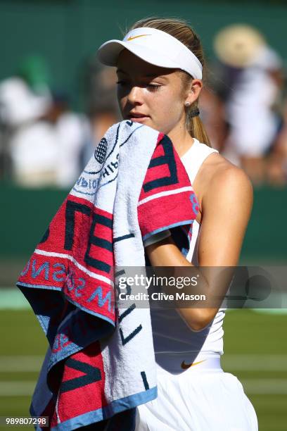 Katie Swan of Great Britain during a break in her Ladies' Singles first round match against Irina-Camelia Begu of Romania during their Ladies'...