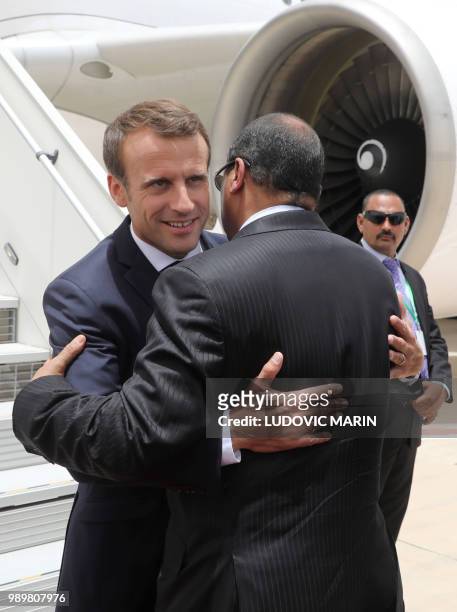 Mauritania President Mohamed Ould Abdel Aziz welcomes French President Emmanuel Macron upon his arrival at Nouakchott where he will attend the...