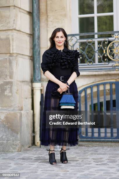 Amira Casar attends the Dior show, during Paris Fashion Week Haute Couture Fall Winter 2018/2019, on July 2, 2018 in Paris, France.