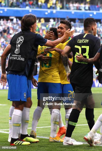 Roberto Firmino of Brazil celebrates with teammates after scoring his team's second goal during the 2018 FIFA World Cup Russia Round of 16 match...