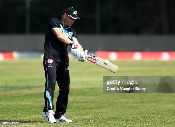 David Warner of Winnipeg Hawks warms up prior to a Global T20 Canada match against Toronto Nationals at Maple Leaf Cricket Club on July 2, 2018 in...