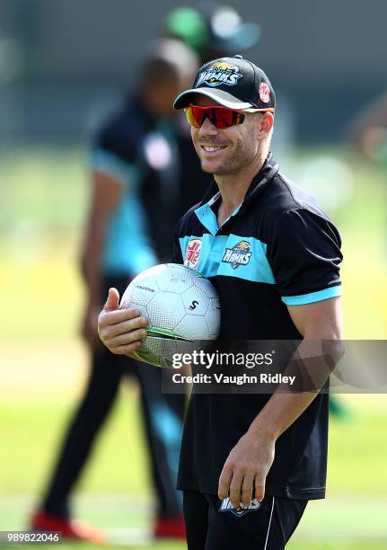 David Warner of Winnipeg Hawks warms up prior to a Global T20 Canada match against Toronto Nationals at Maple Leaf Cricket Club on July 2, 2018 in...