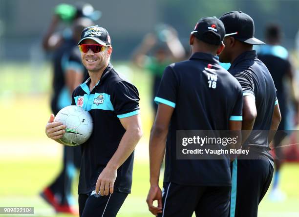 David Warner of Winnipeg Hawks warms up prior to a Global T20 Canada match against Toronto Nationals at Maple Leaf Cricket Club on July 2, 2018 in...