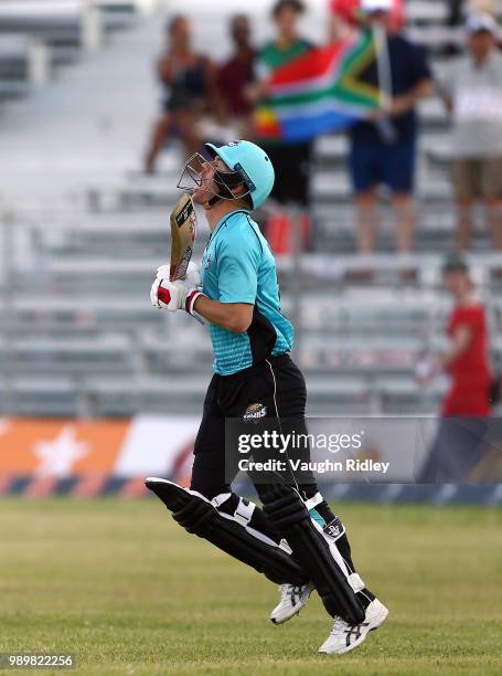 David Warner of Winnipeg Hawks runs out to open the batting during a Global T20 Canada match against Toronto Nationals at Maple Leaf Cricket Club on...