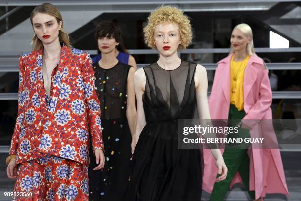 Models present creations by Maison Rabih Kayrouz at the end of the 2018-2019 Fall/Winter Haute Couture collection fashion show in Paris, on July 2,...