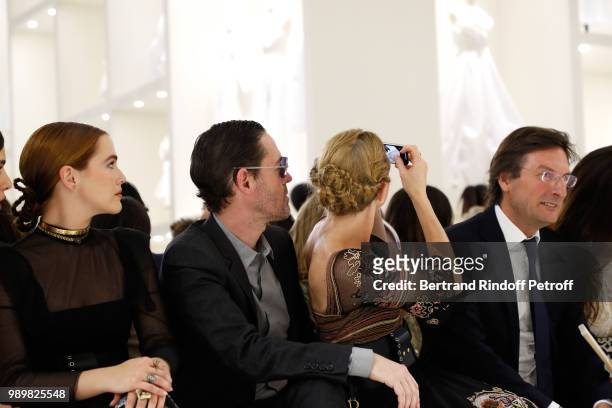 Zoey Deutch, Michael Polish, Kate Bosworth and CEO of Dior Pietro Beccari attend the Christian Dior Haute Couture Fall Winter 2018/2019 show as part...