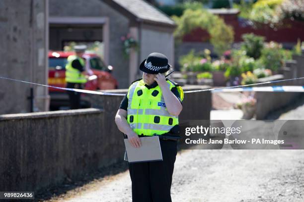 Police cordon outside a house on Ardbeg Road on the Isle of Bute in Scotland, after officers found the body of a young girl on the site of the former...